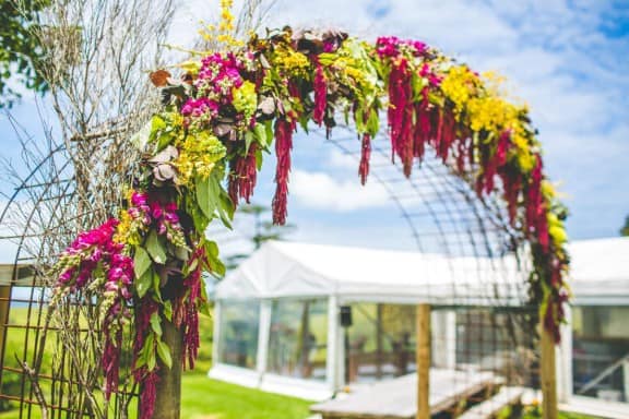 Floral arch by Gypsy Flora | Jess & Nick's Colourful Bush Bank Wedding | Photography by The Evoke Company