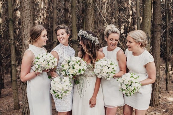 Bridesmaids in white | Photography by Fiona Vail