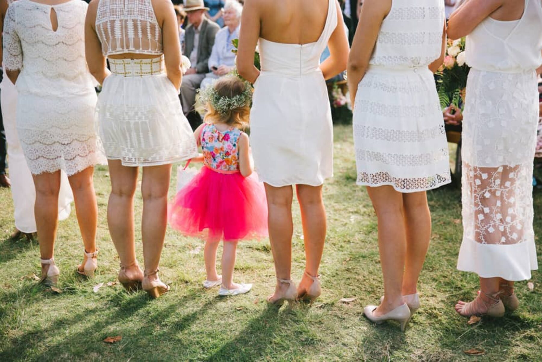 Bridesmaids in different white dresses / Kait Photography