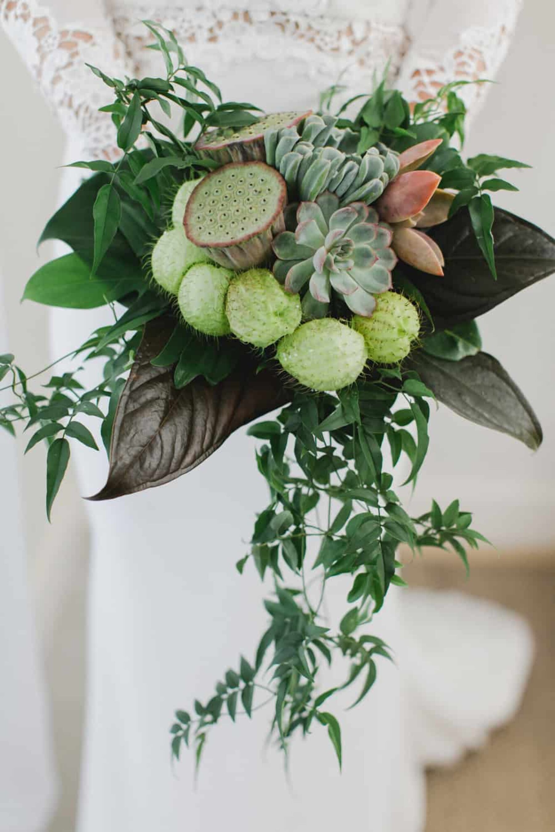 tropical lotus pod and succulent bouquet