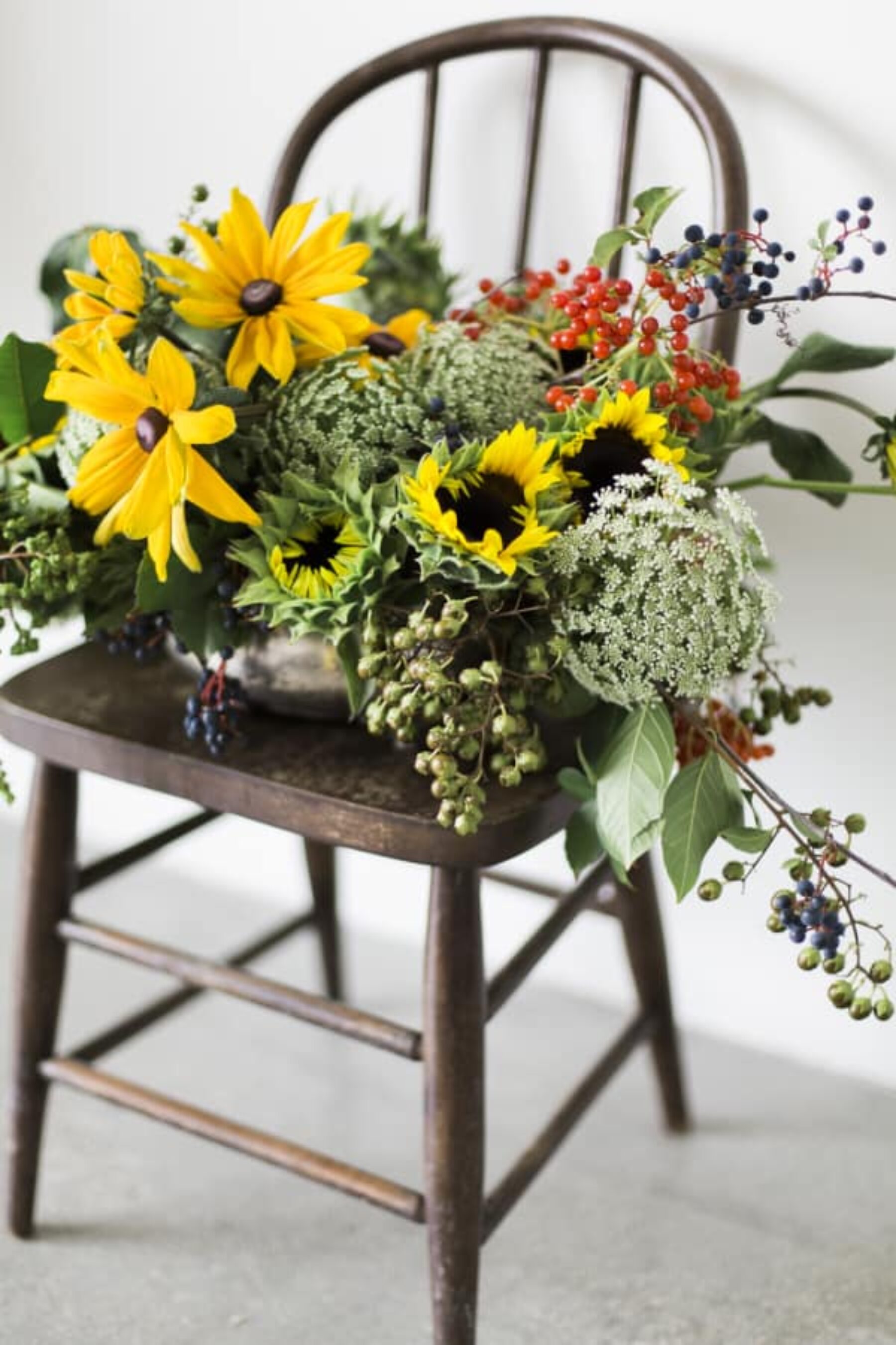 Sunflowers and bent wood chair