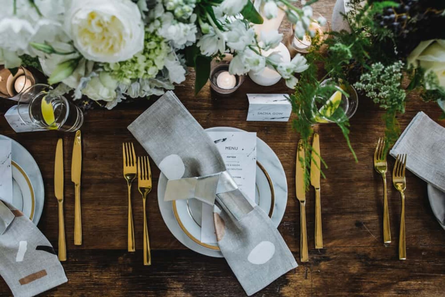 luxe table setting with gold cutlery