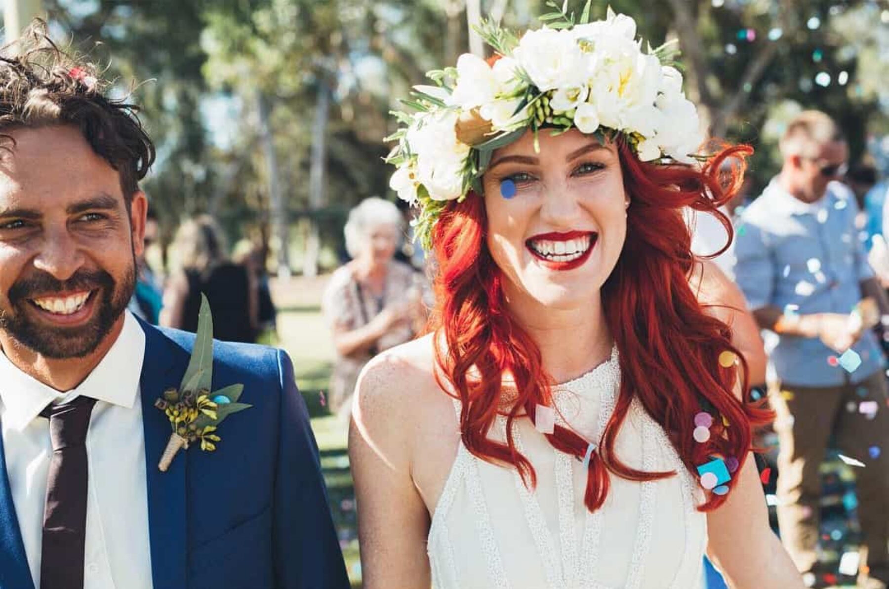 red headed bride with white flower crown