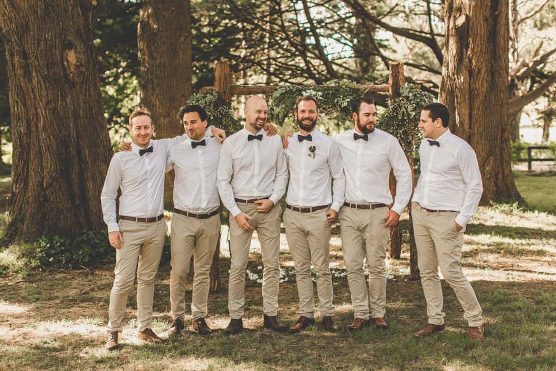 groomsmen in bow ties