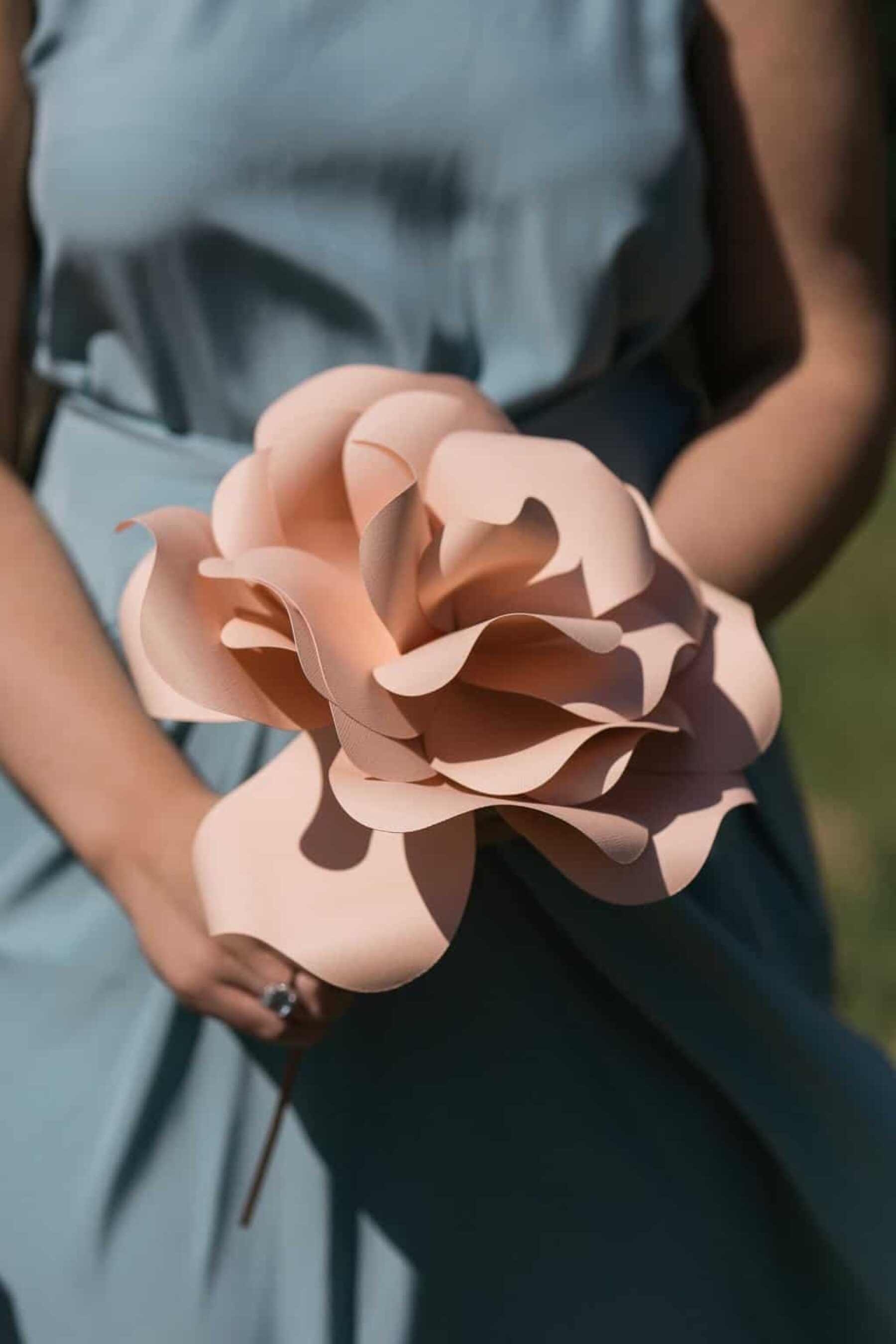 bridesmaid with giant paper flower