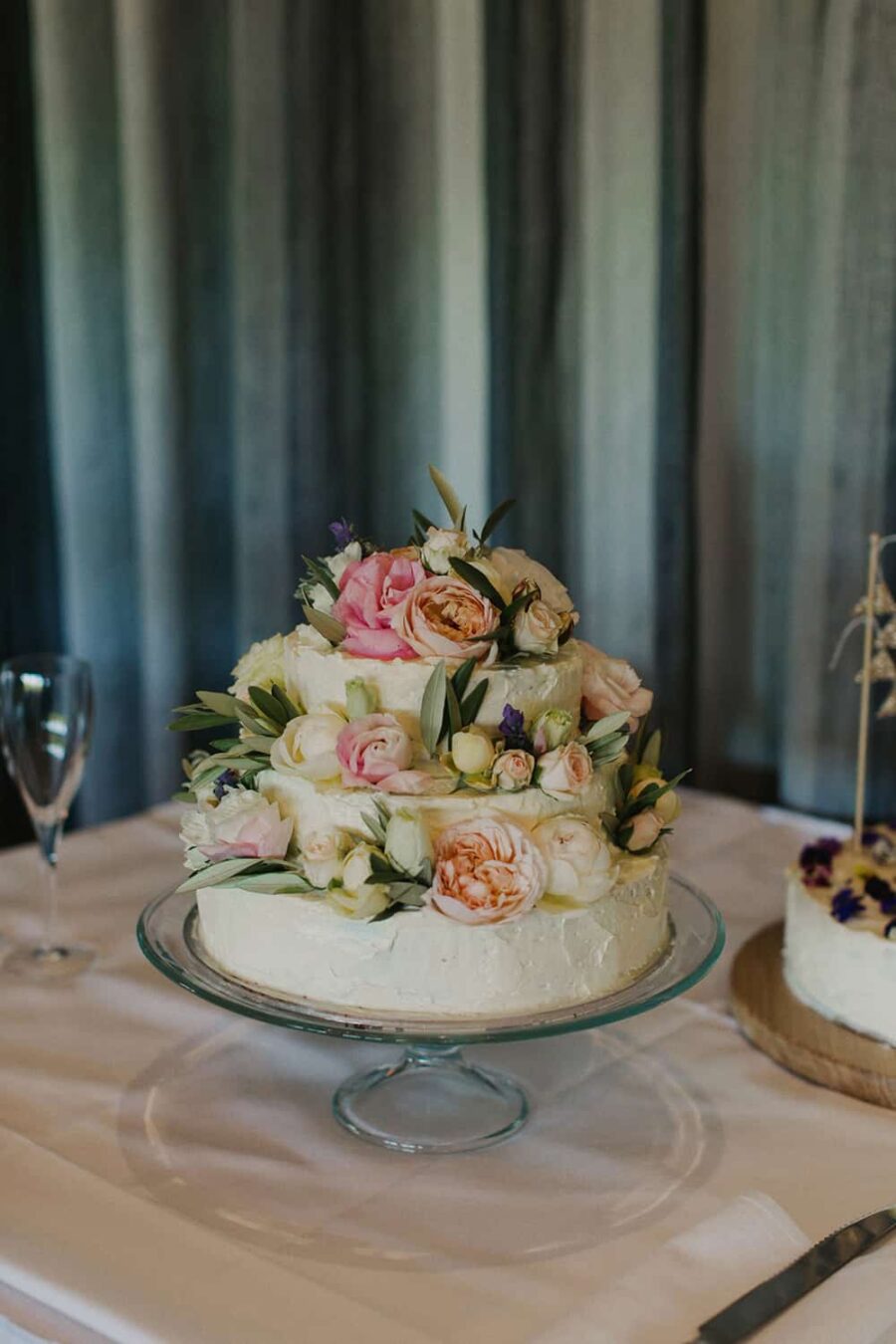 homemade wedding cake with fresh rose