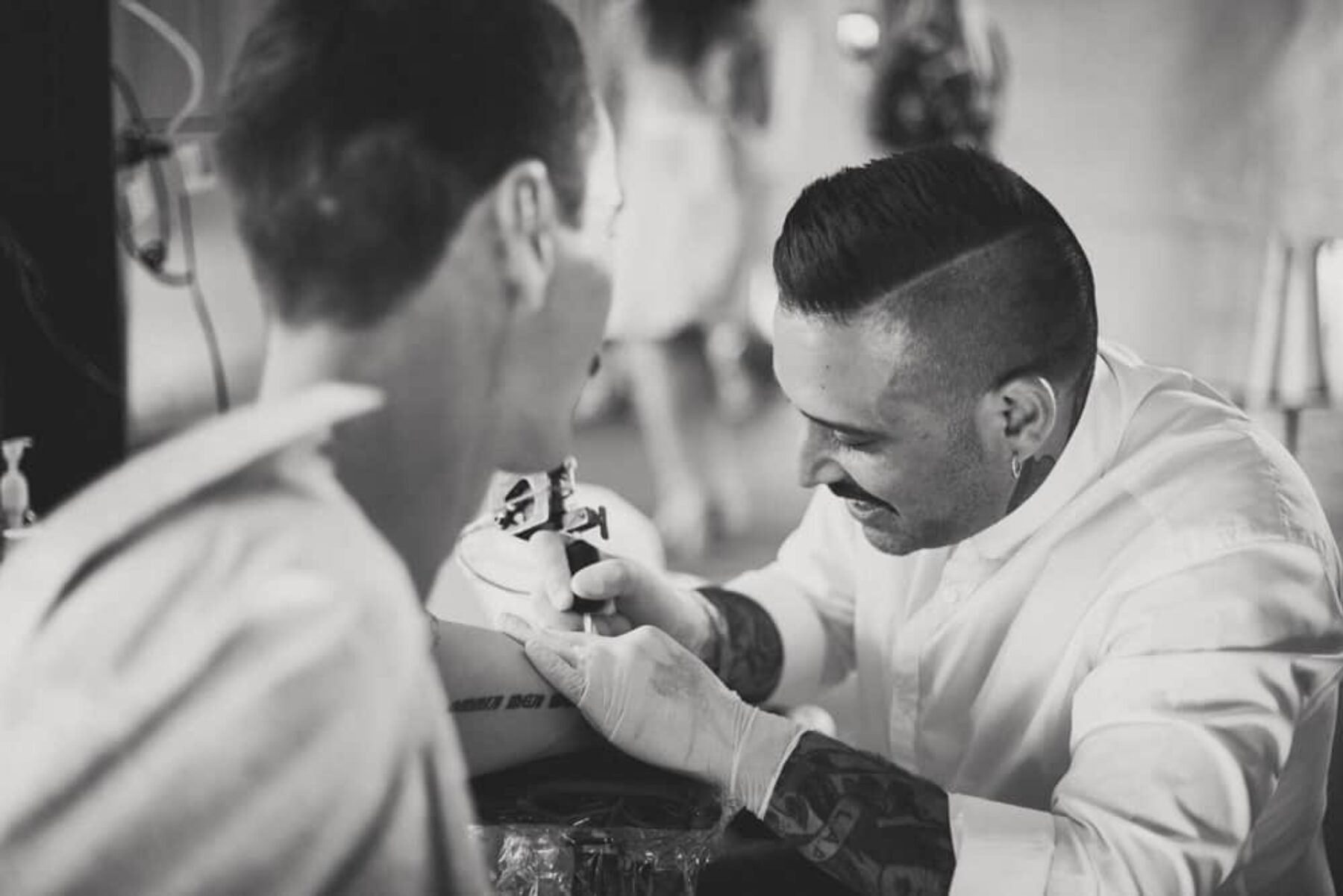 groom getting wedding tattoo