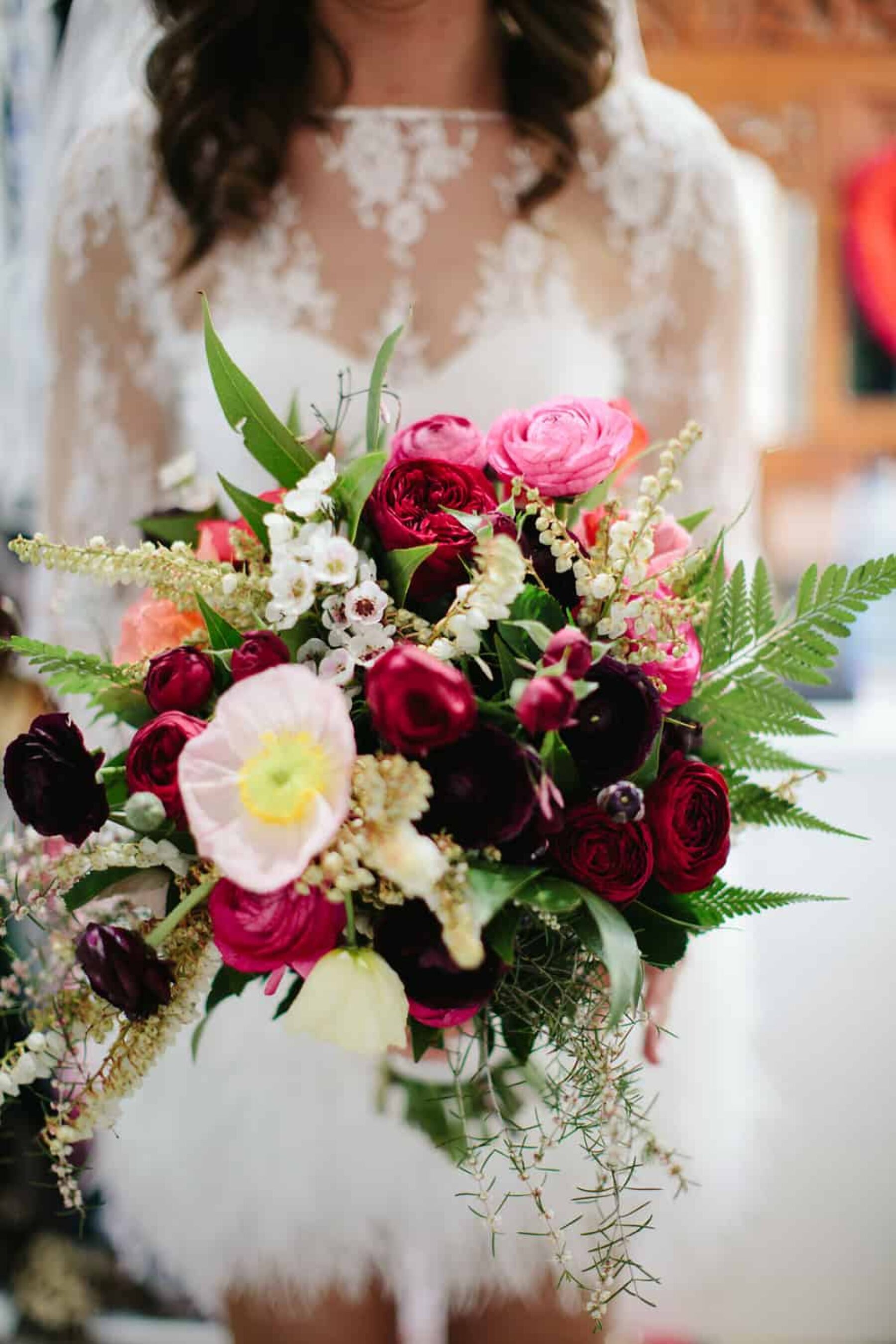 pink poppy and ranunculus wedding bouquet