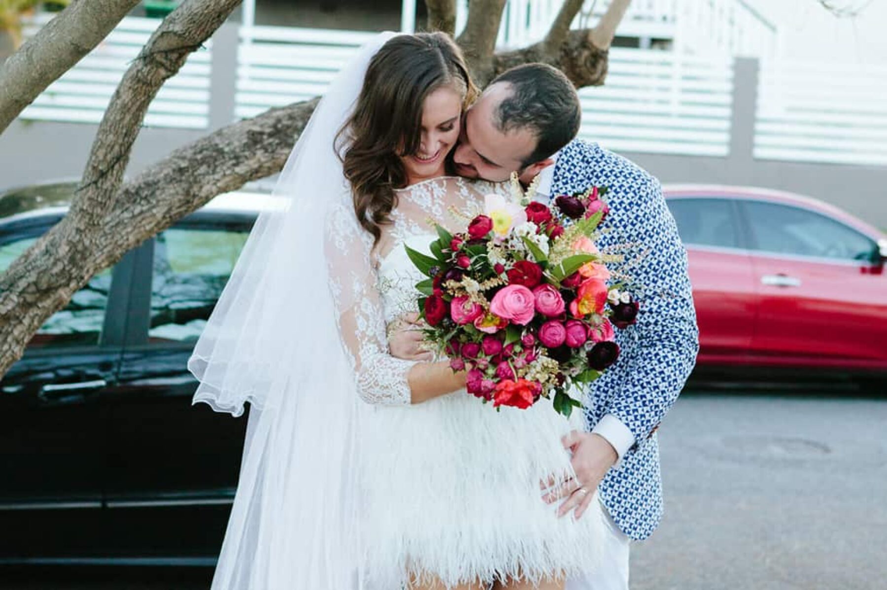 pink poppy and ranunculus wedding bouquet