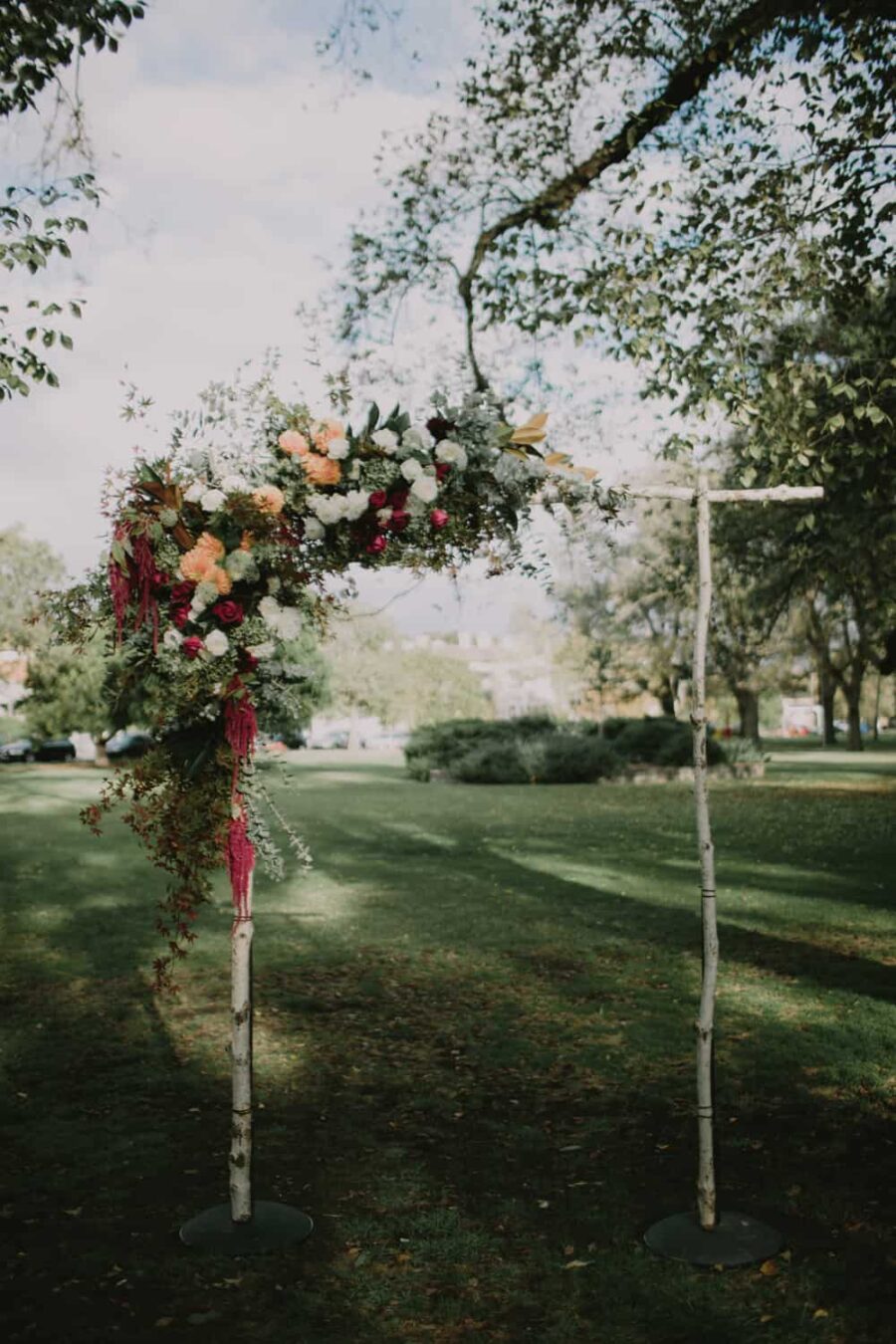 simple wedding arch with floral installation