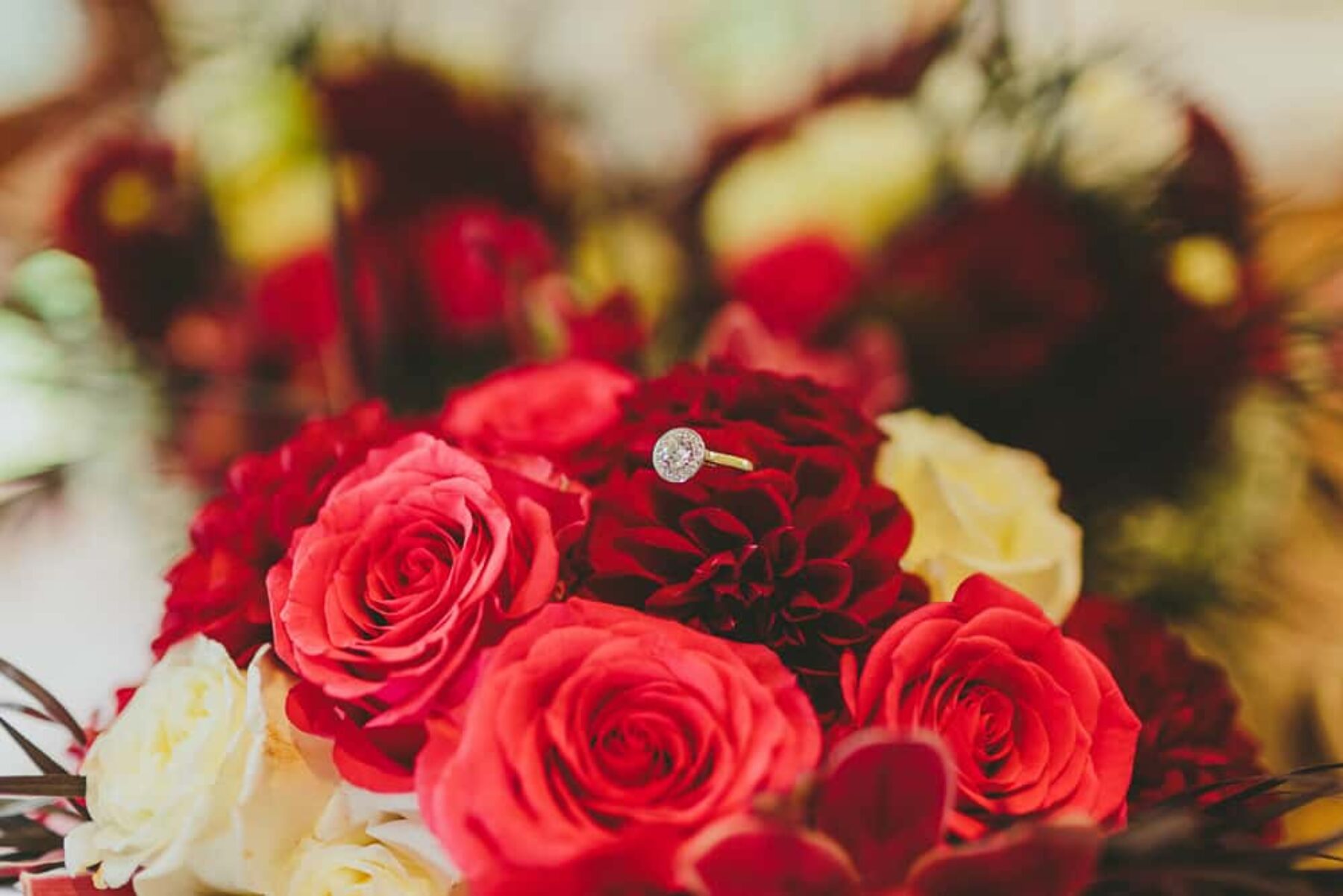 engagement ring on wedding bouquet