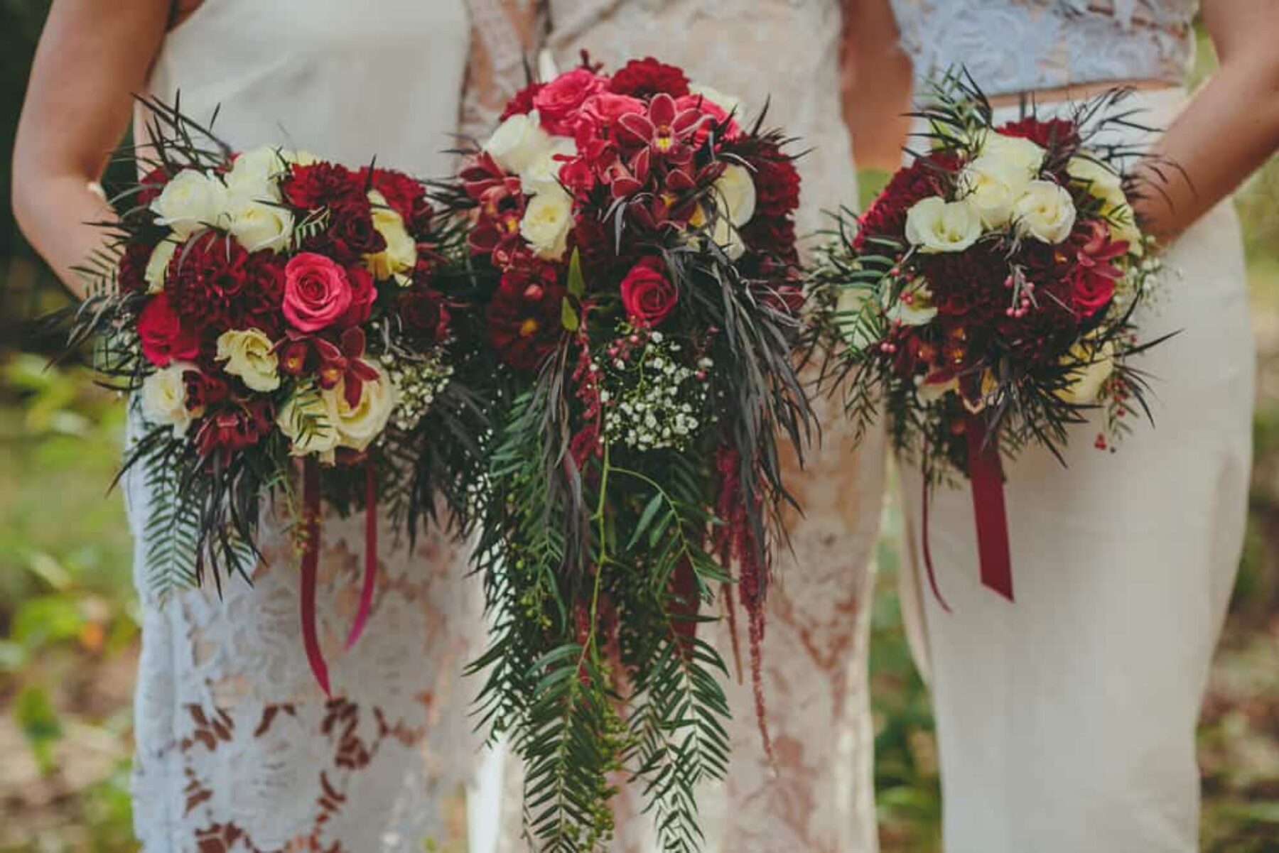 marsala toned bouquets with cascading foliage