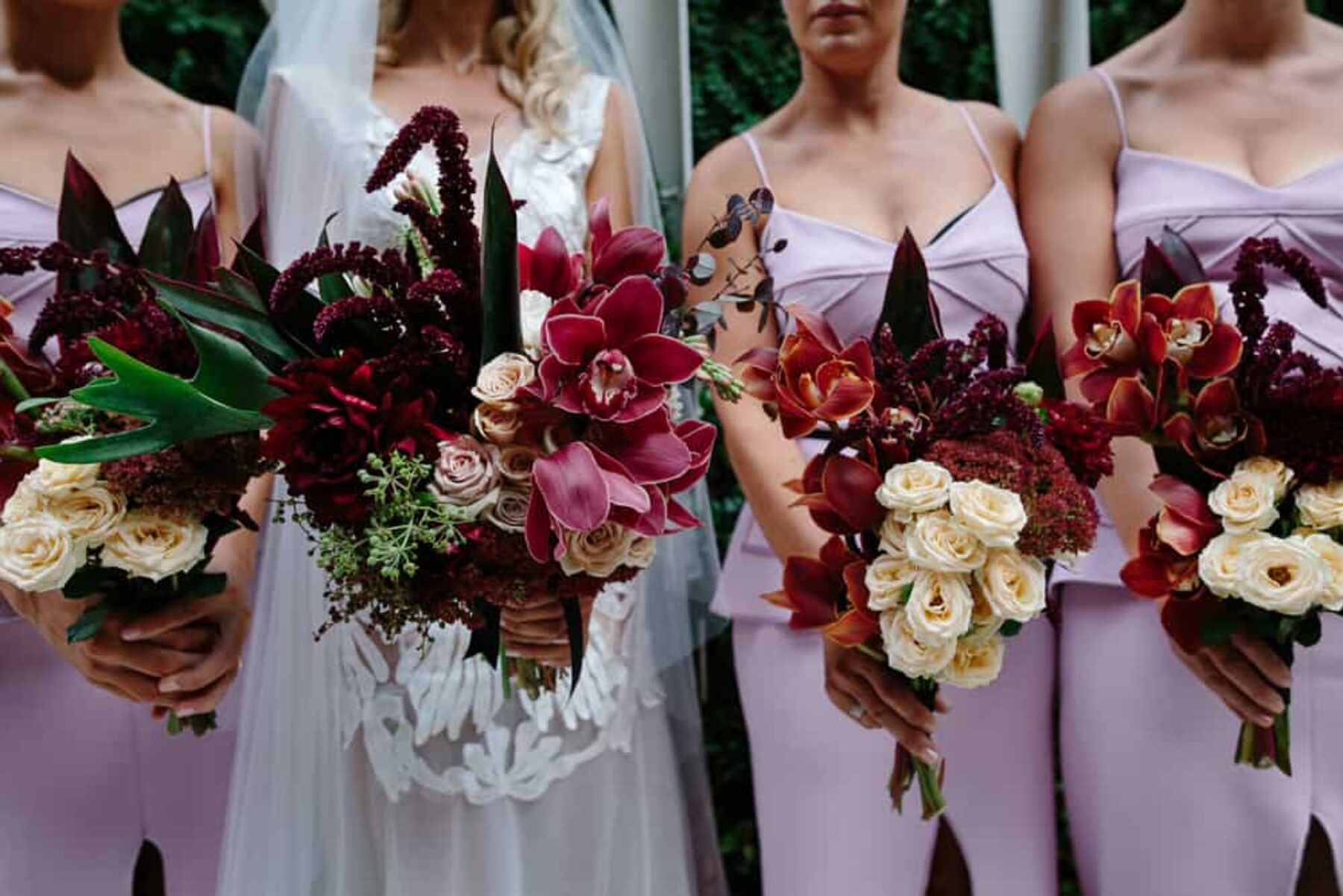 masarla bouquets with orchids roses and amaranth