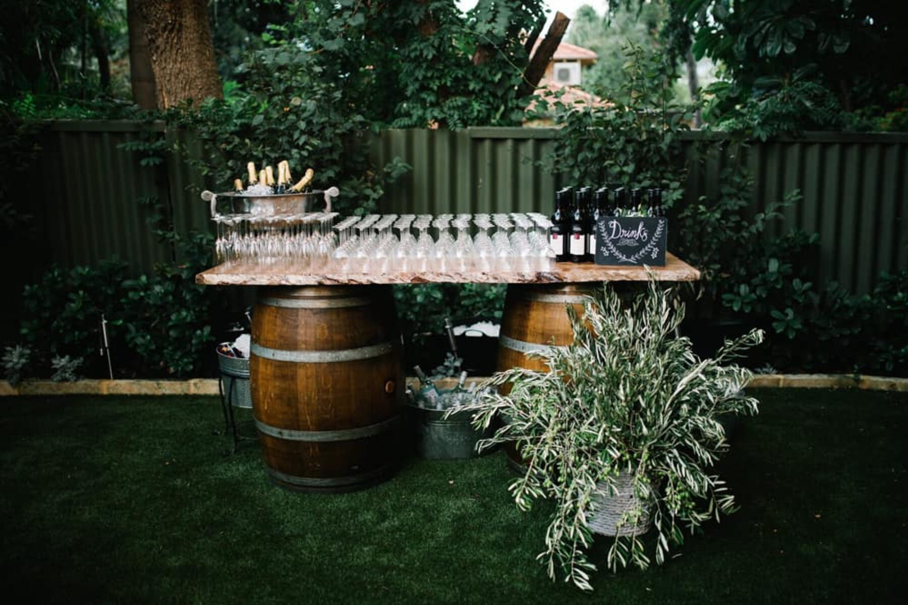 wine barrel bar for a backyard wedding
