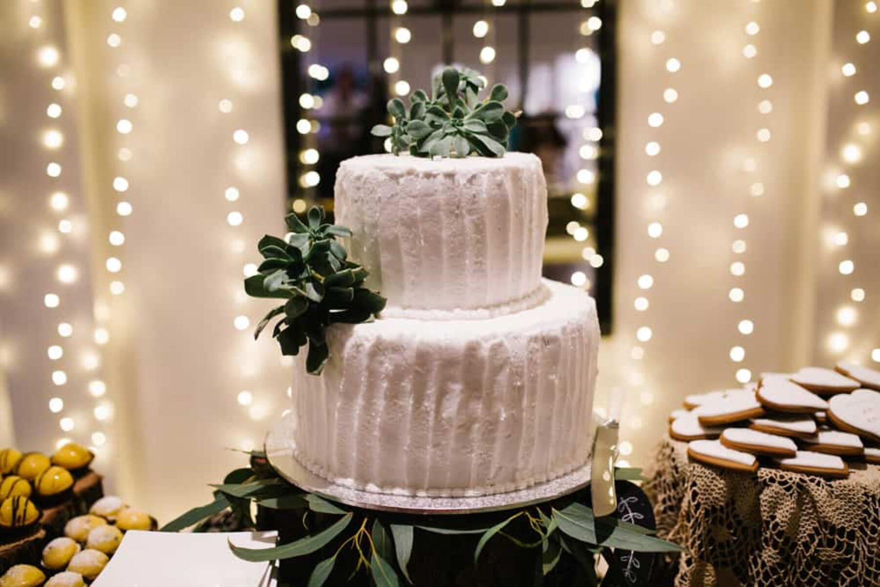 homemade wedding cake with succulent cake topper