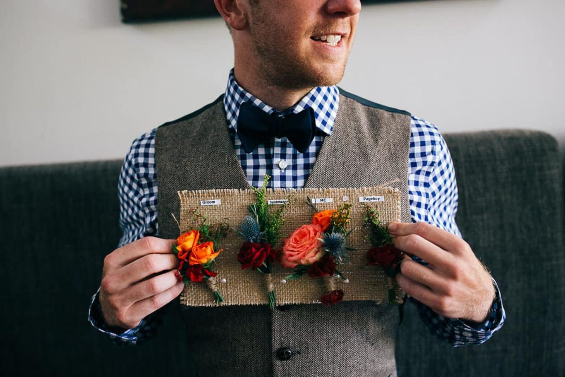 groom with boutonnieres