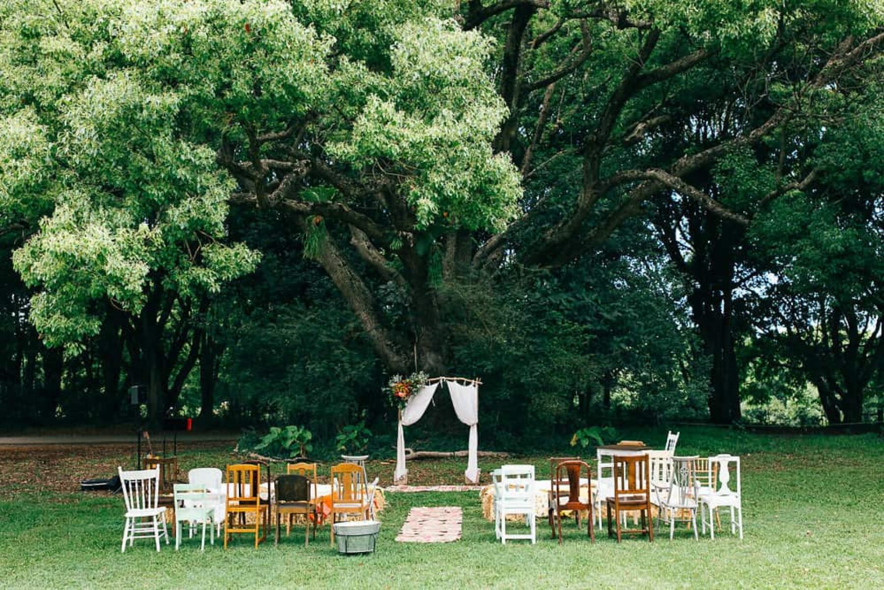 ceremony setup with mismatched vintage chair