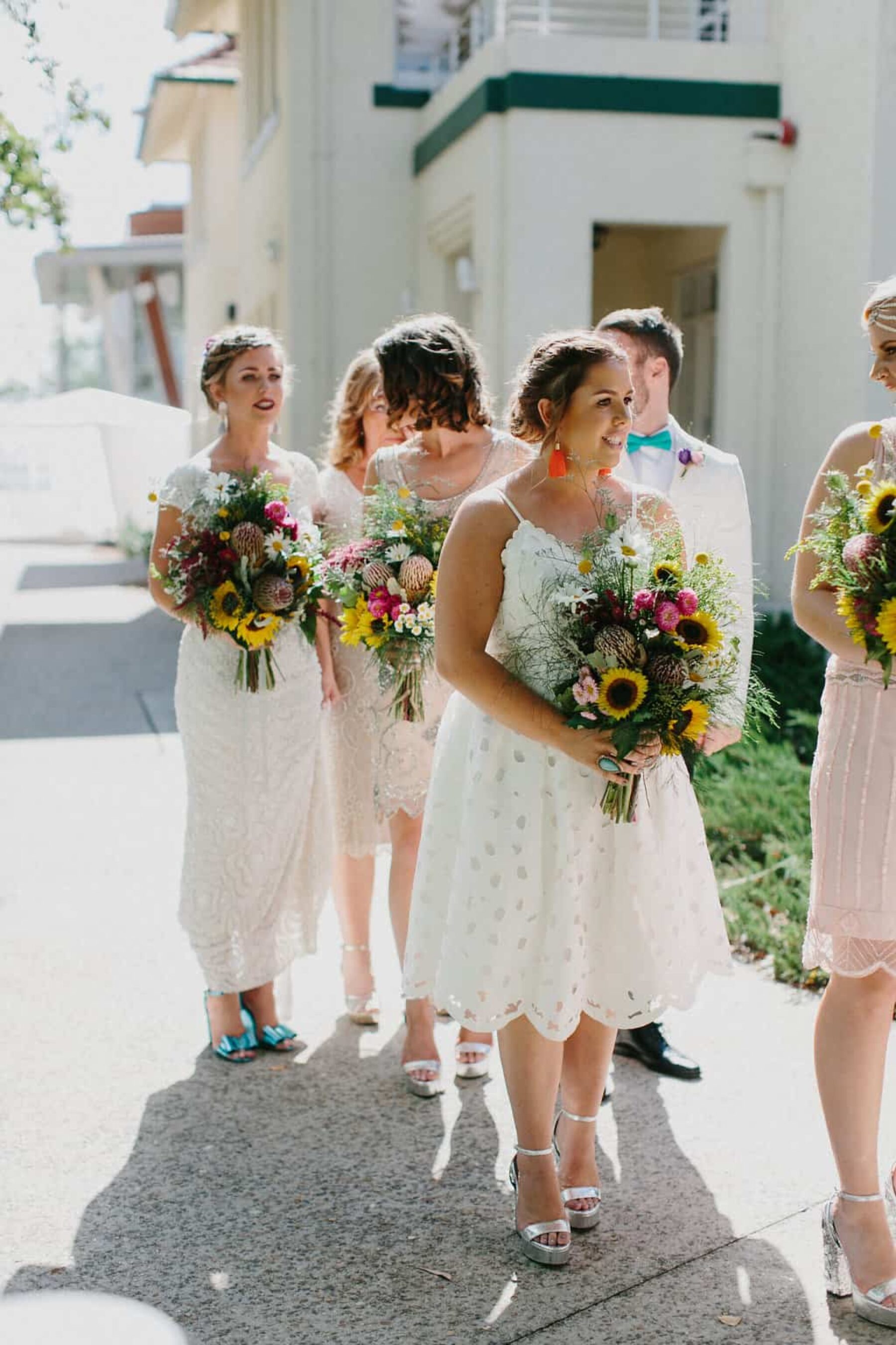 bridesmaids with colourful bouquets