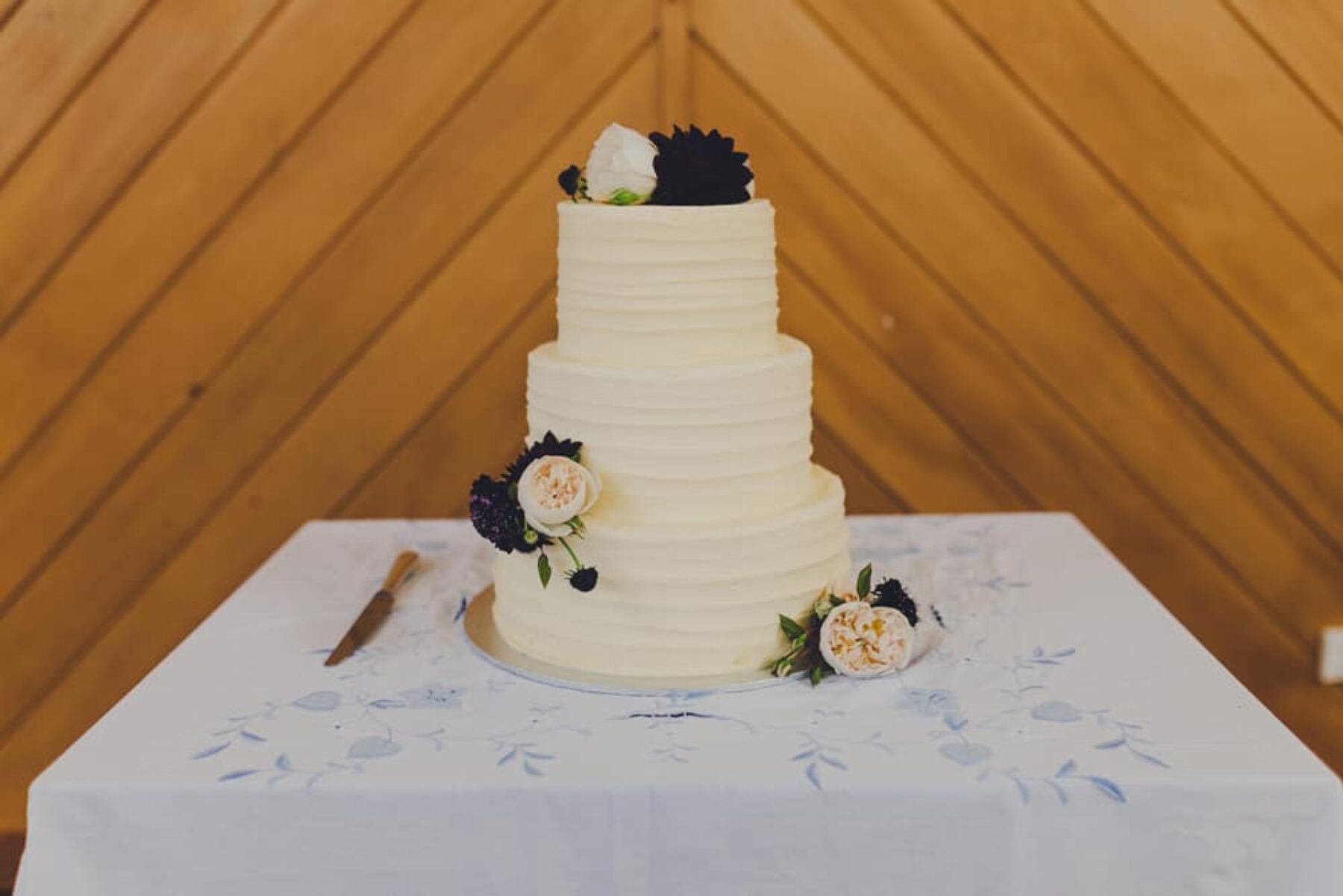 three tier lemon and raspberry wedding cake