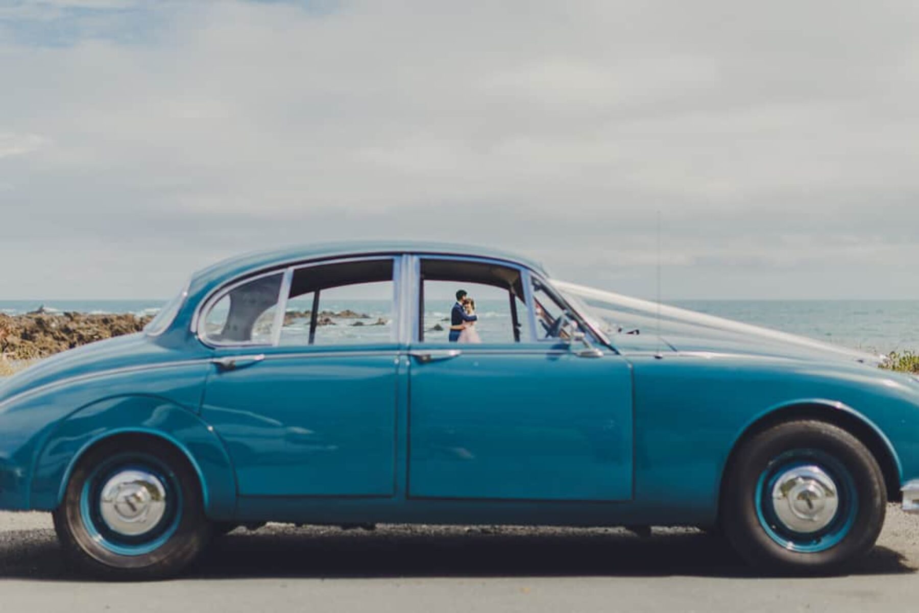 blue vintage wedding car