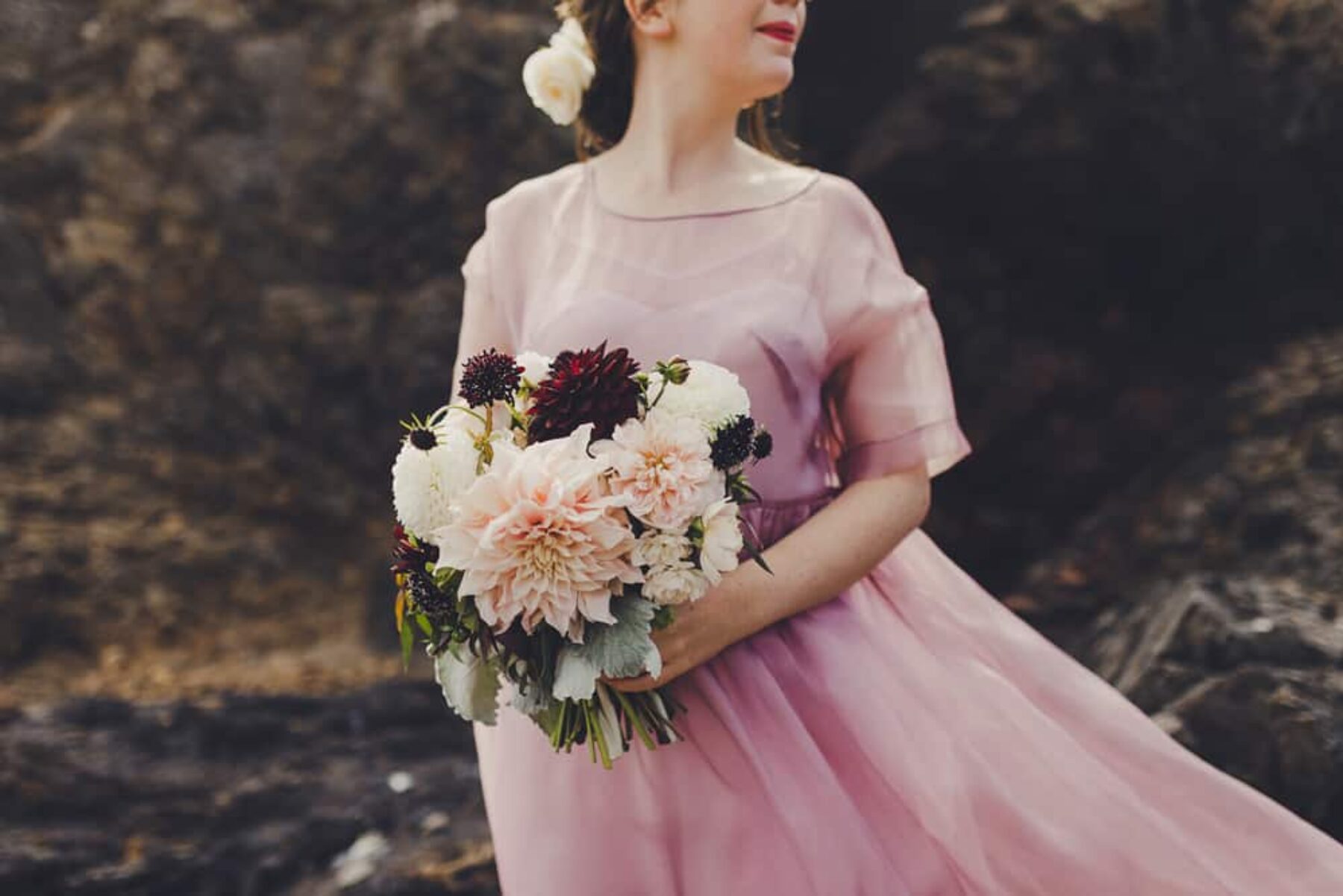 bride wearing dusty pink wedding dress