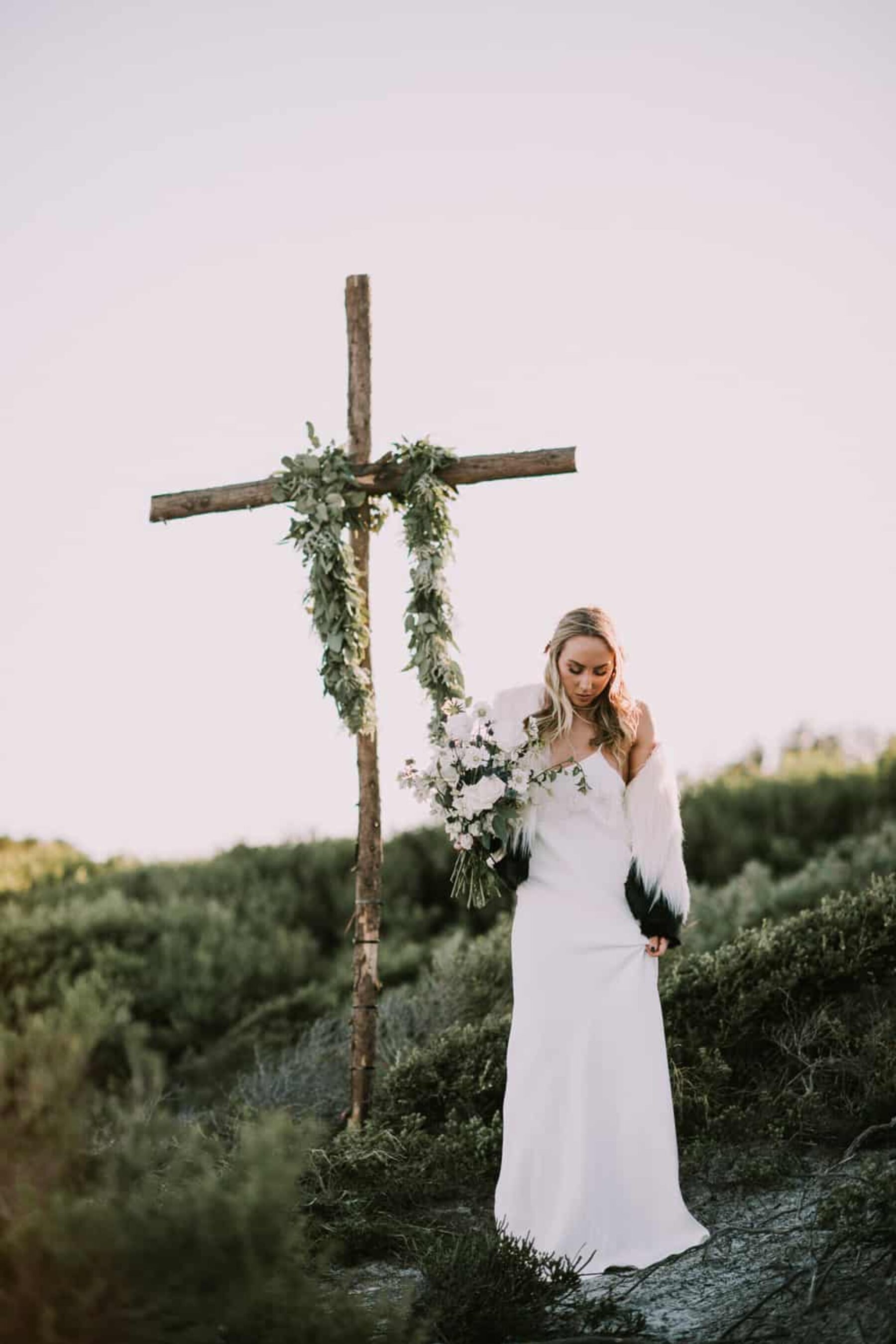 boho cross with floral garland