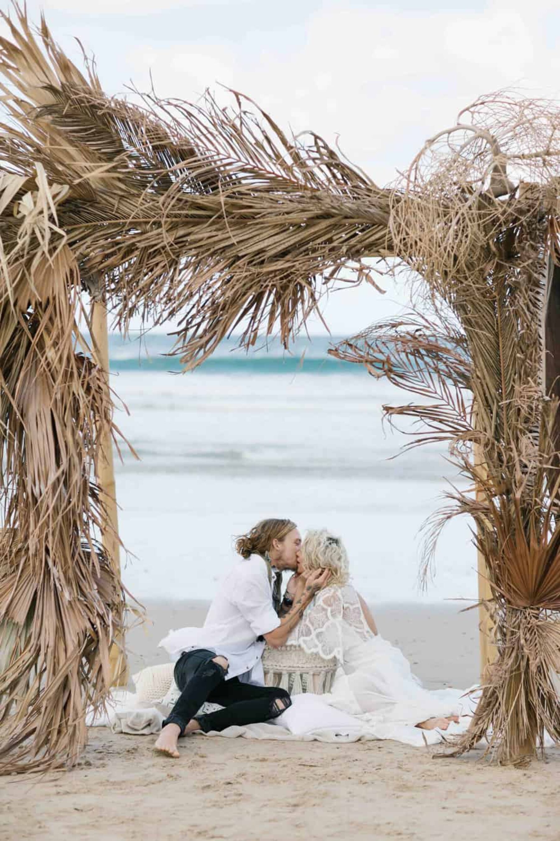 beach wedding arbour of dried palm fronds