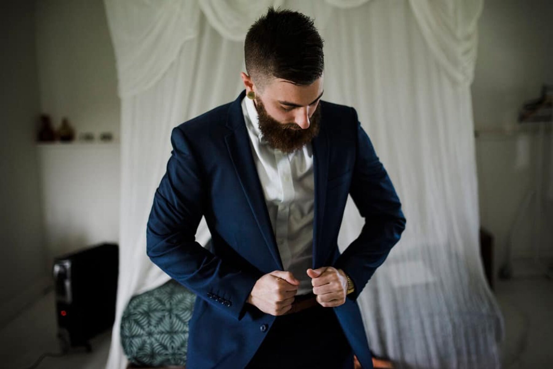 hipster groom in navy suit