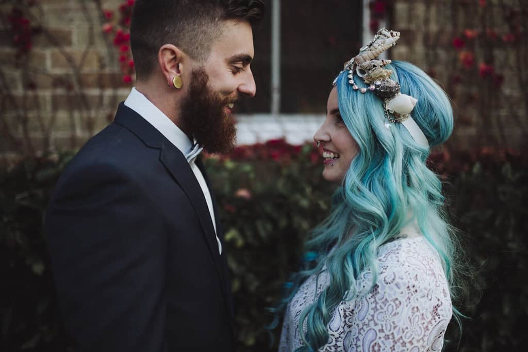 blue haired bride and bearded groom