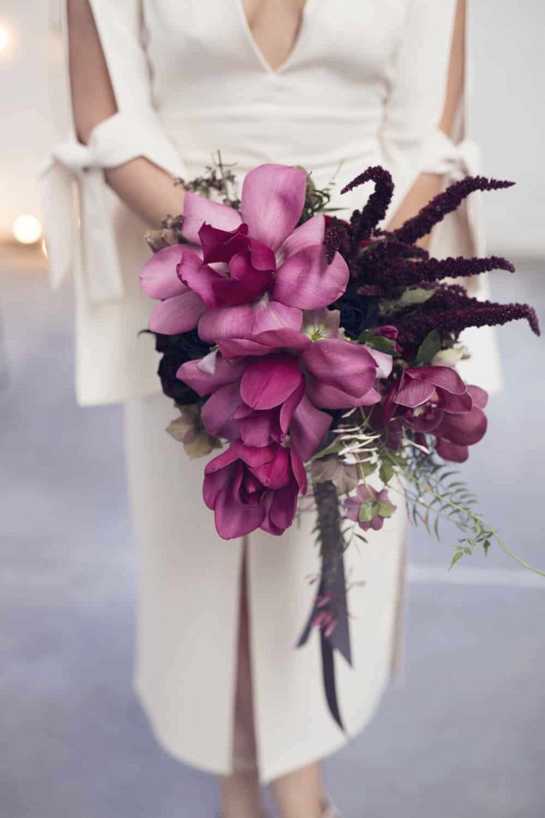 magenta magnolia and amaranth wedding bouquet