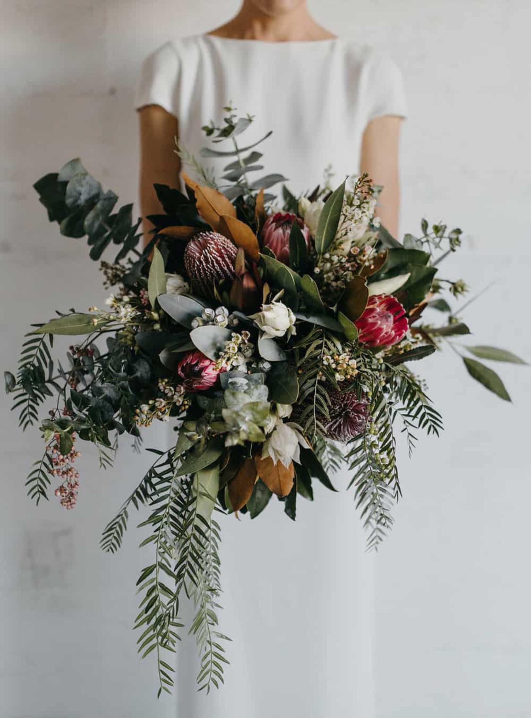 unstructured native bouquet with proteas