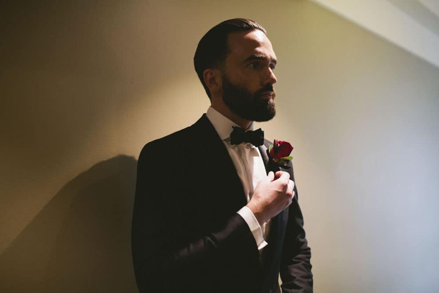 bearded groom in classic black tux