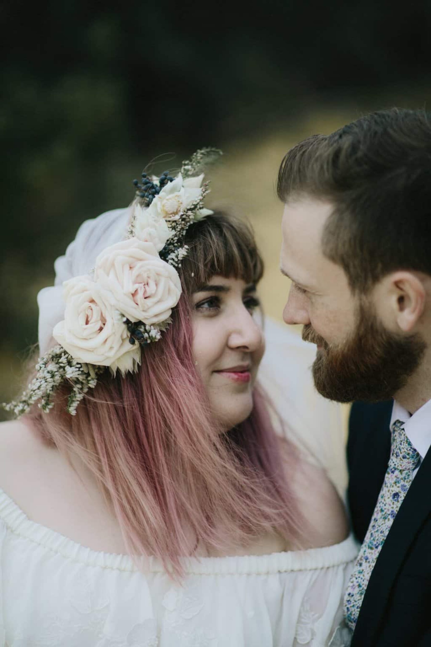 bohemian pink-haired bride with flower crown