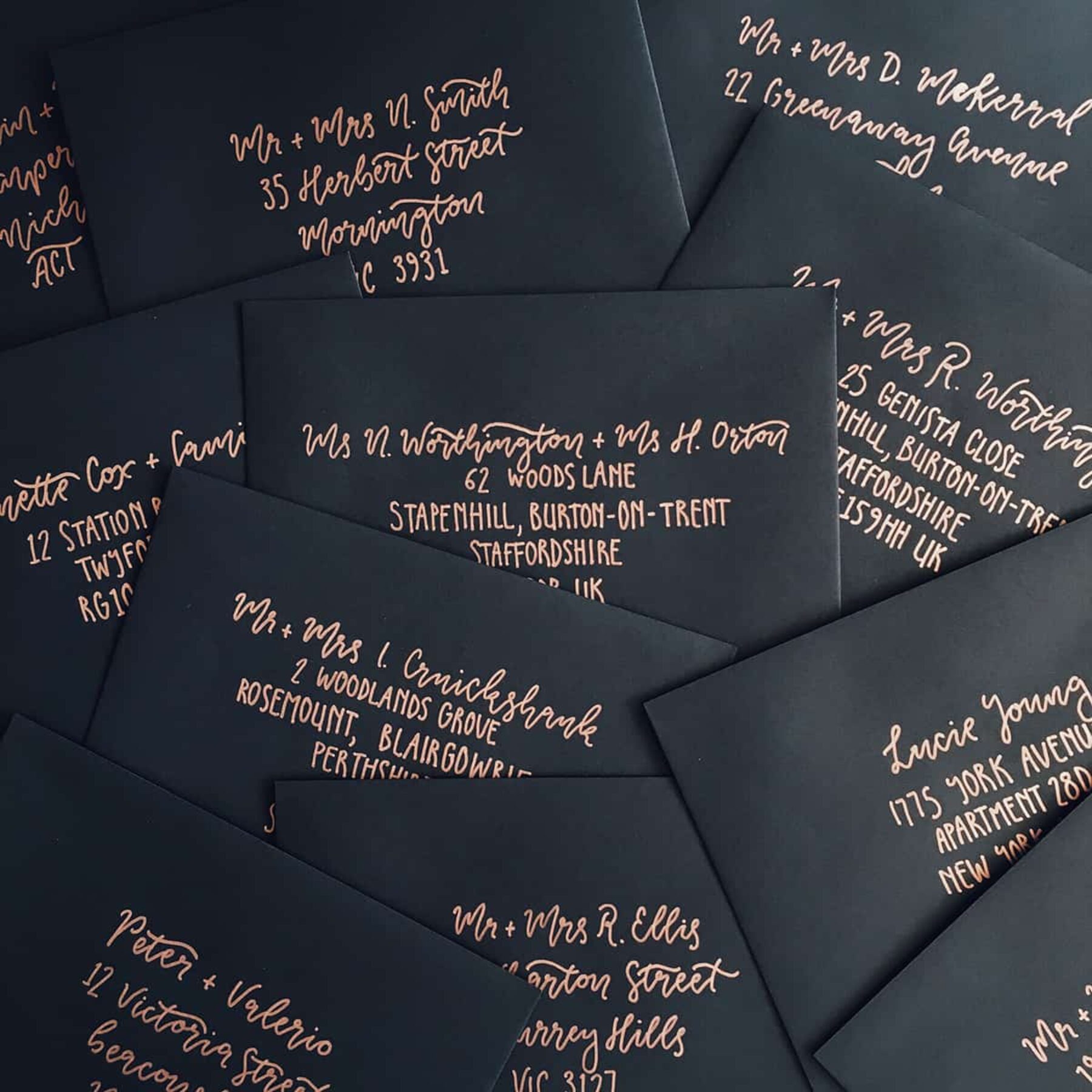hand lettered wedding invitation envelopes by Paige Tuzee
