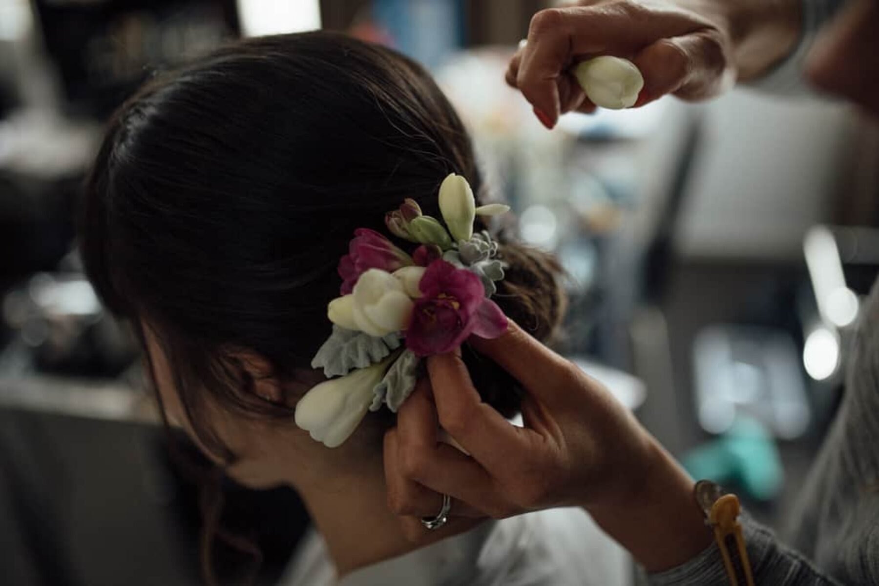 simple bridal bun with flowers
