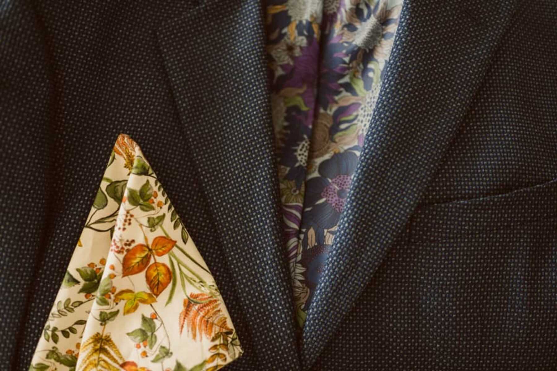 modern suit with floral lining and pocket square