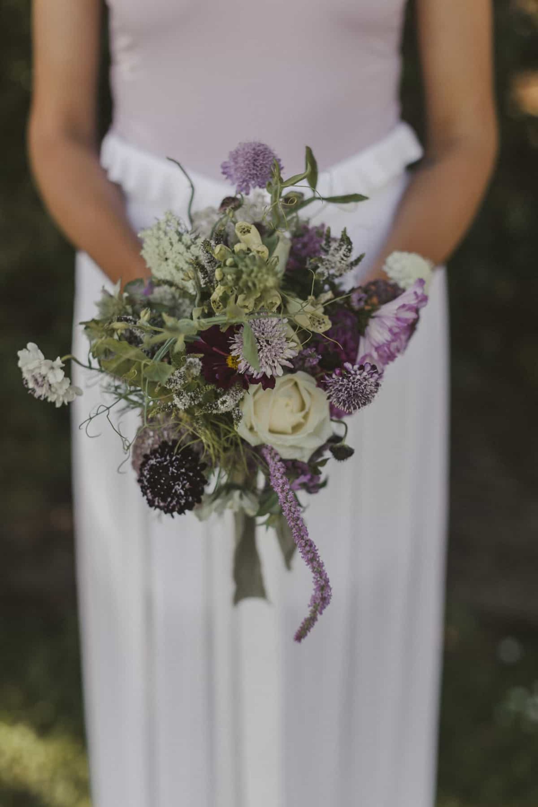 bridesmaid bouquet in mixed purple hues