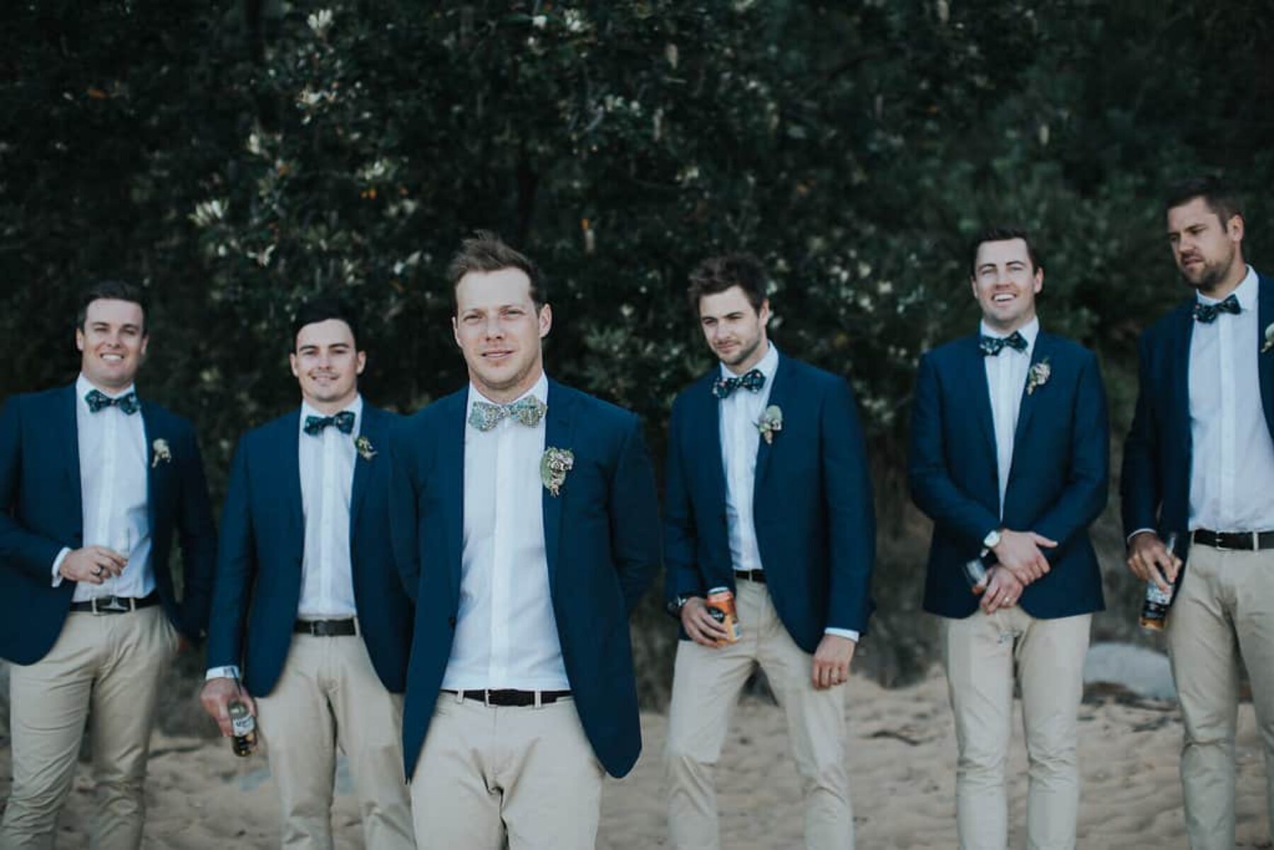 casual groomsmen in chinos and navy blazers