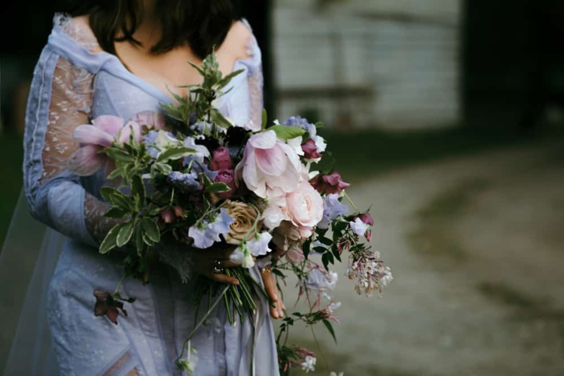 lilac bridal bouquet with magnolias