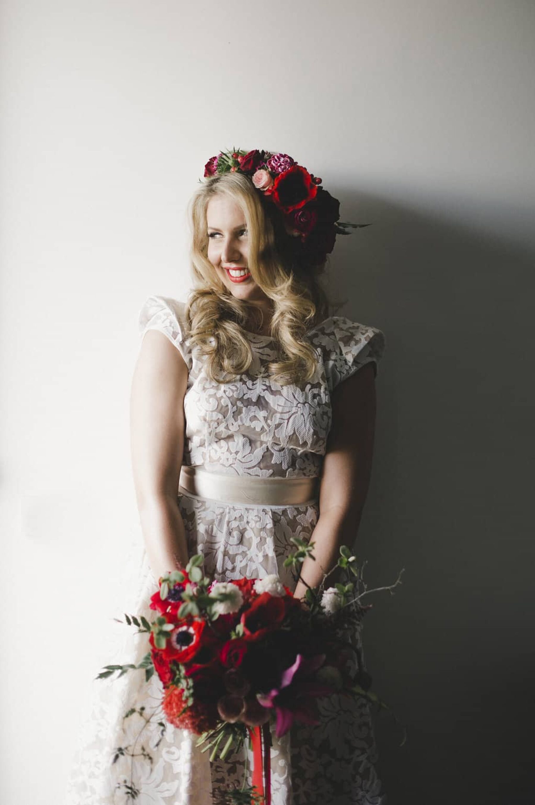 vintage bride with bold red flower crown
