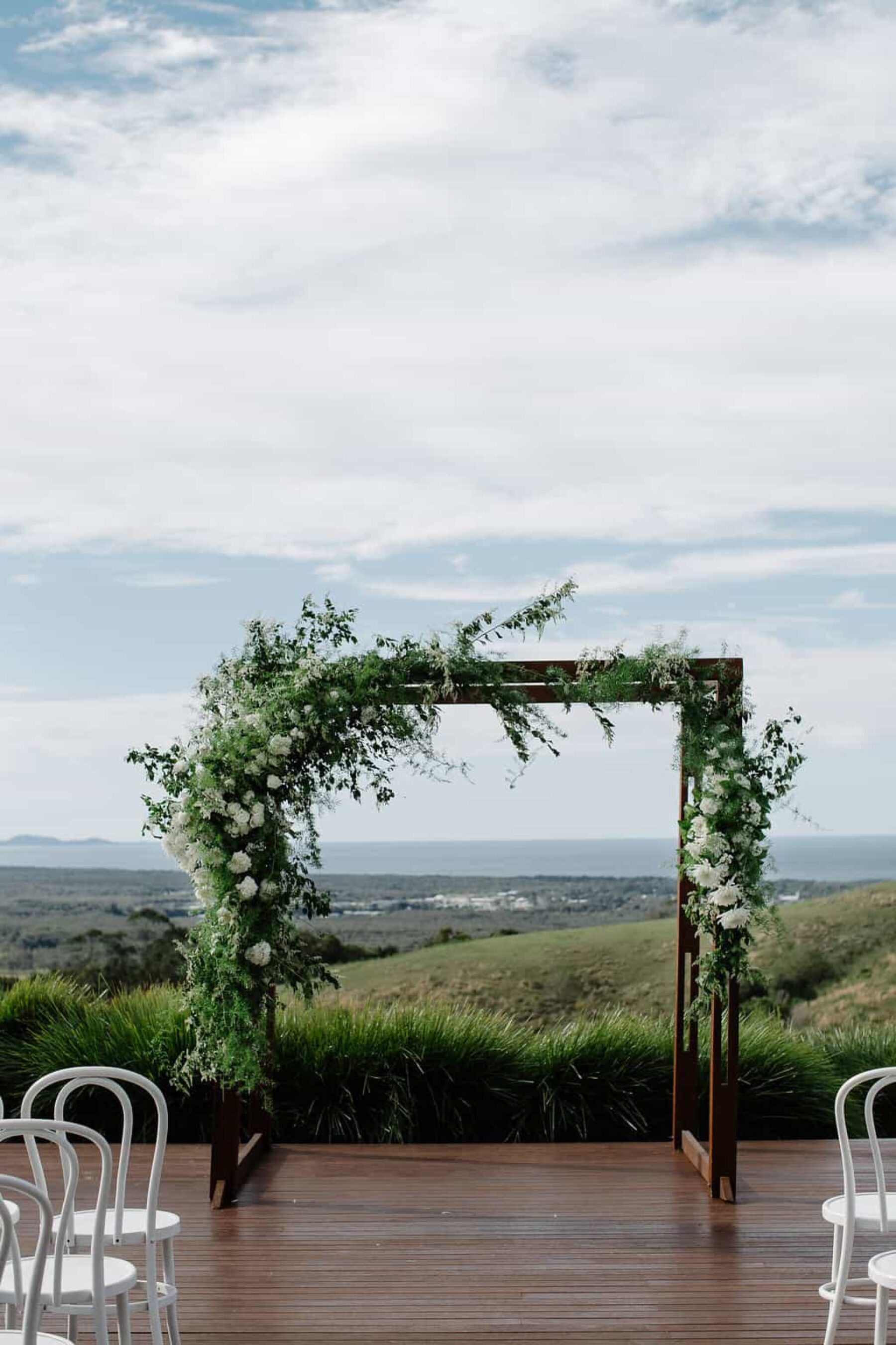 green and white floral arbour