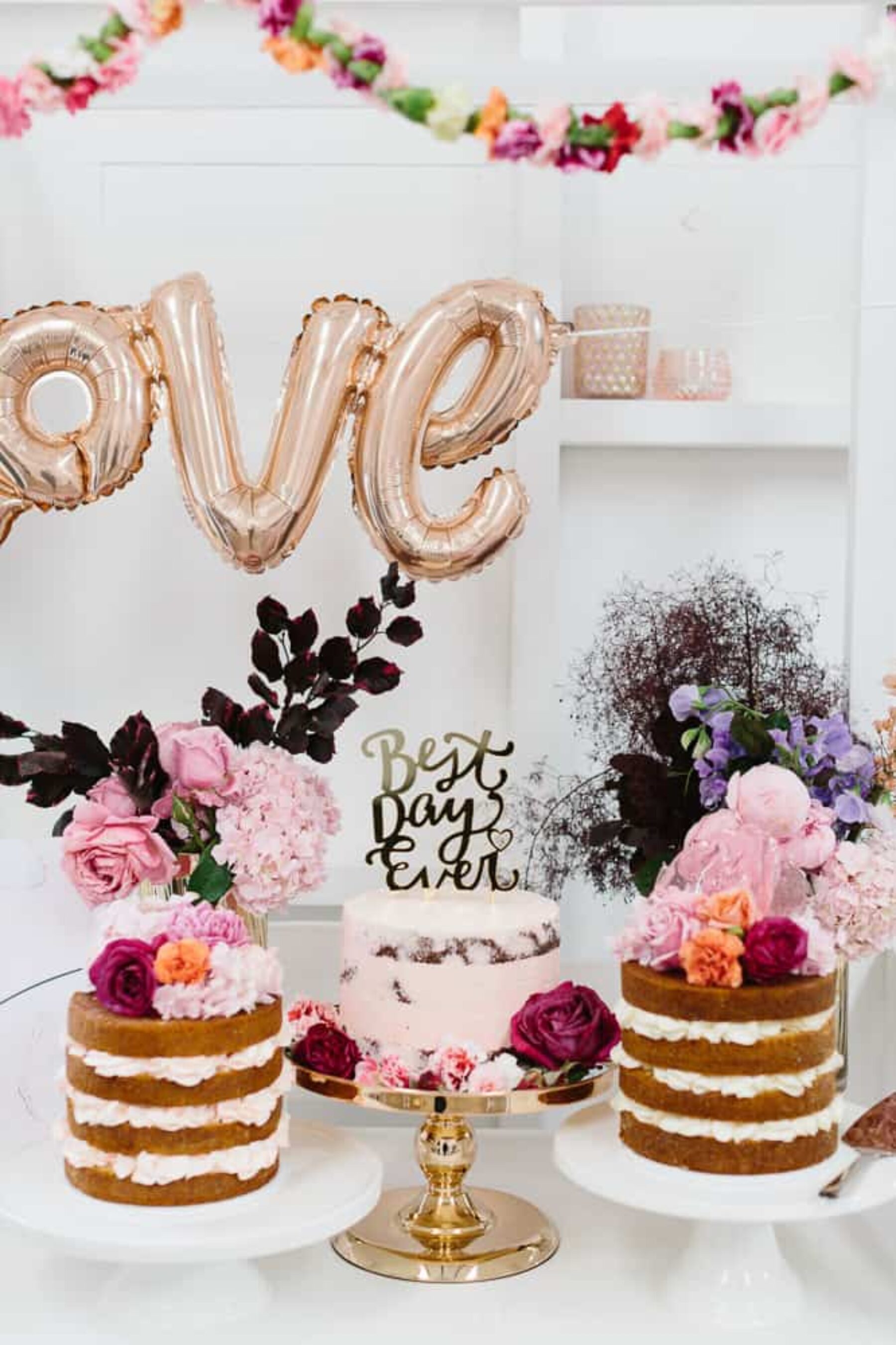 cake cart with gold LOVE balloons