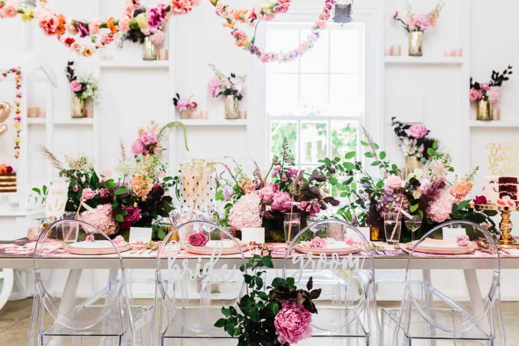 floral tablescape with ghost chairs
