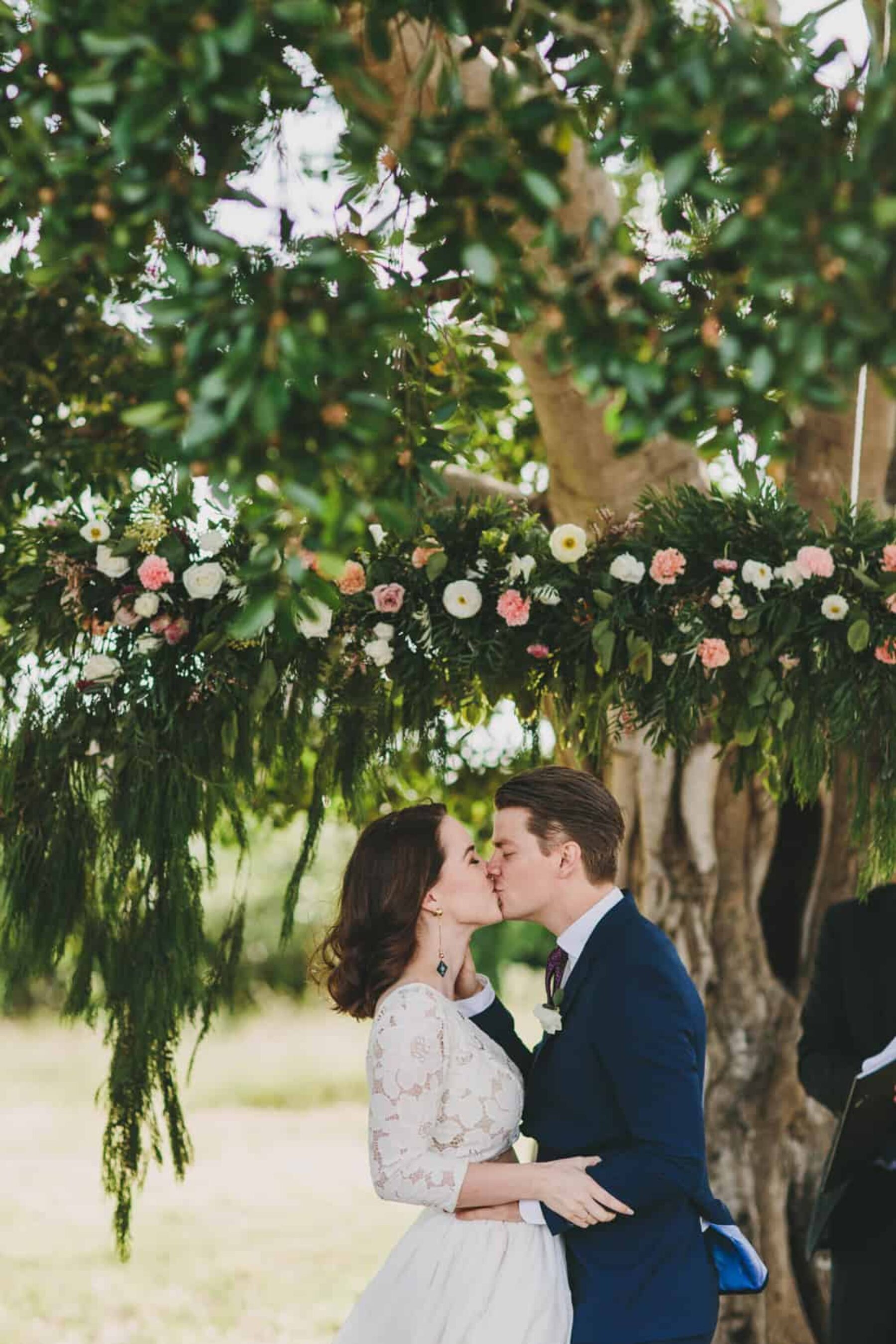 poppy and foliage wedding arch