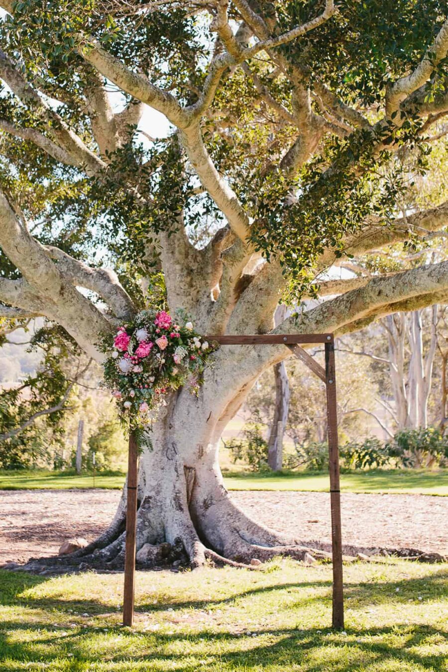 timber floral wedding arbour