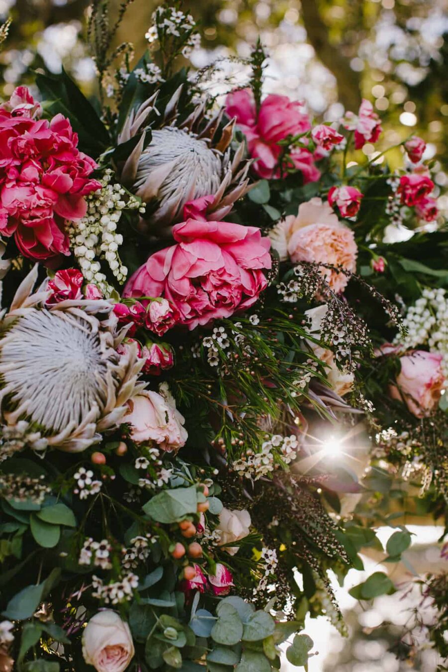 timber floral wedding arbour