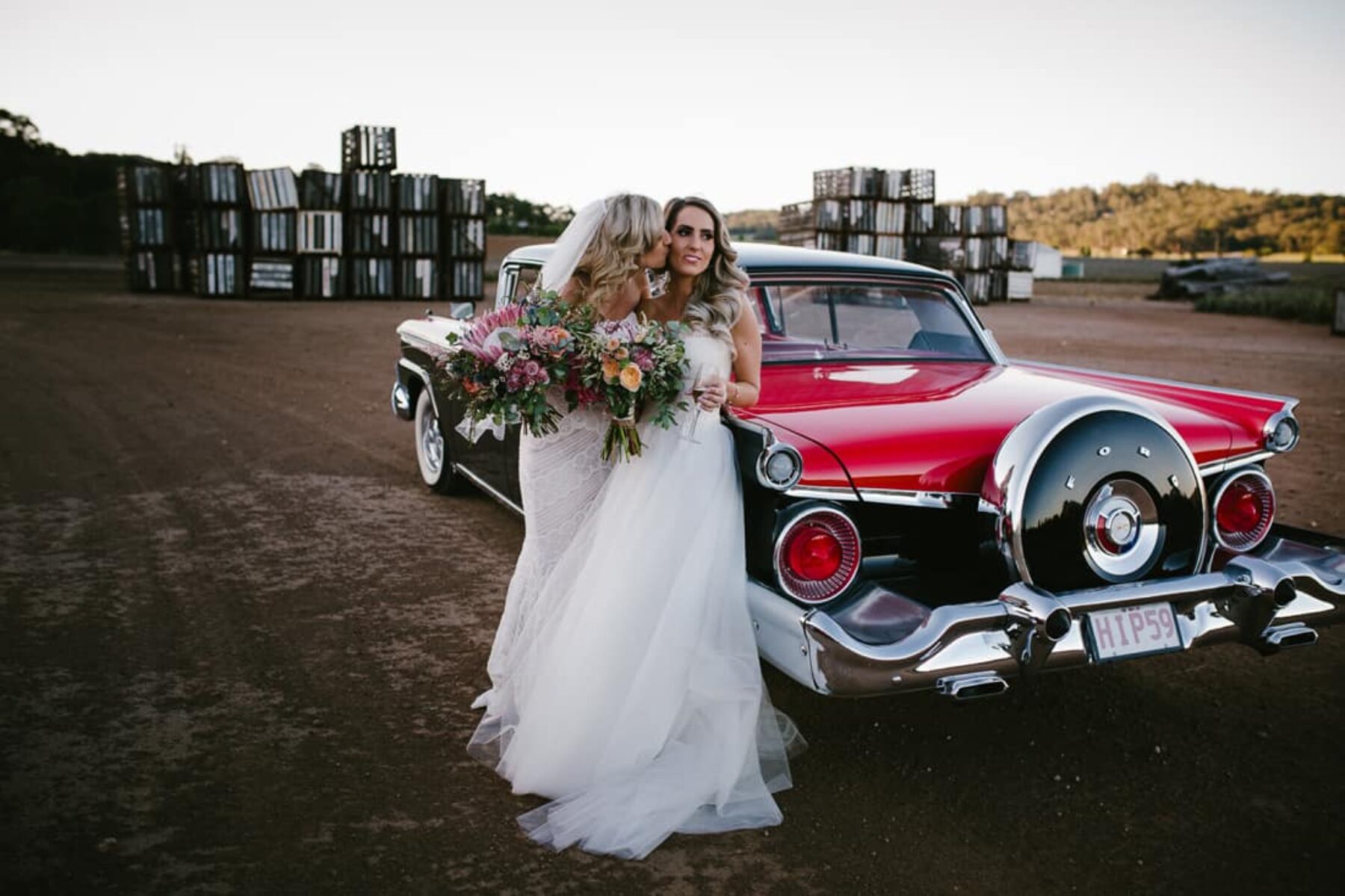 gorgeous brides with vintage wedding car