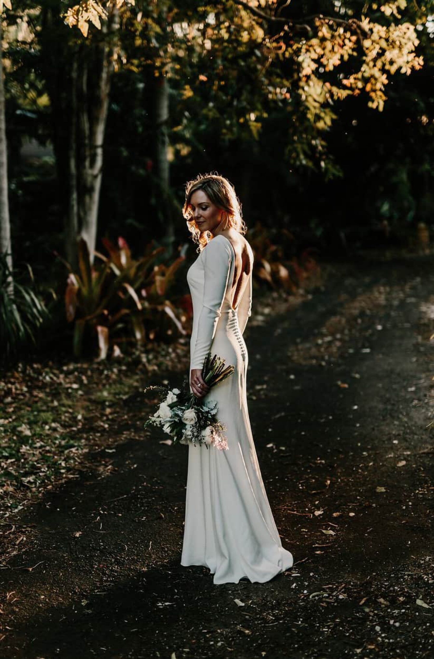 minimalist bride in long sleeve wedding dress