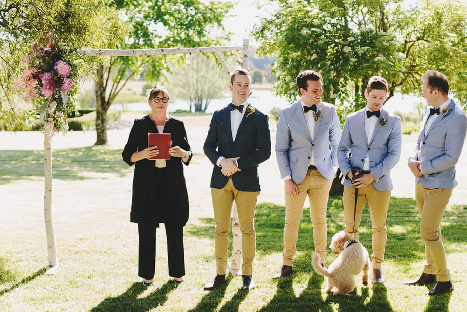 dapper groom and groomsmen in chinos and blue blazers