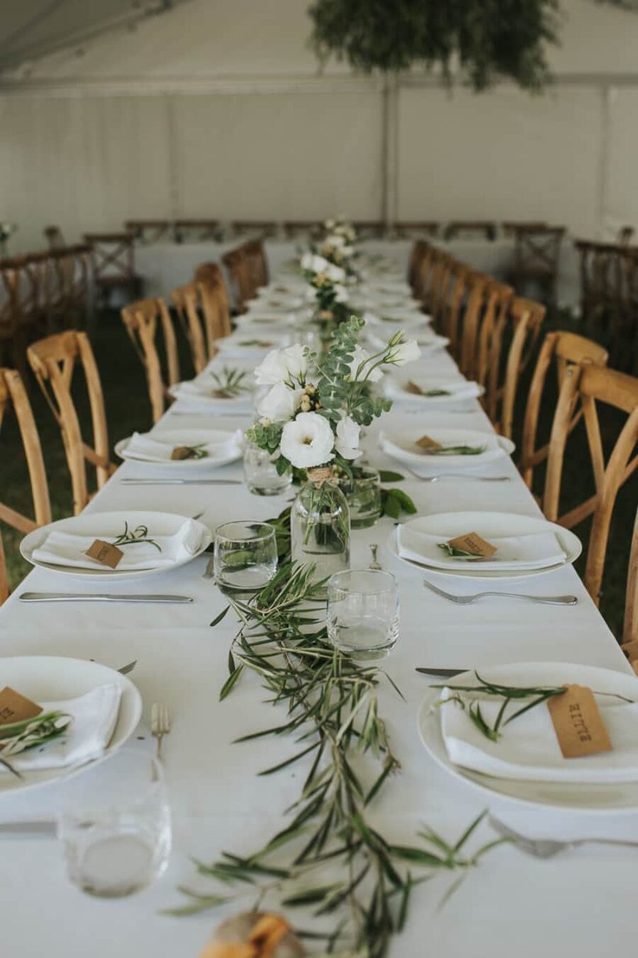 rustic table setting with olive leaf runner